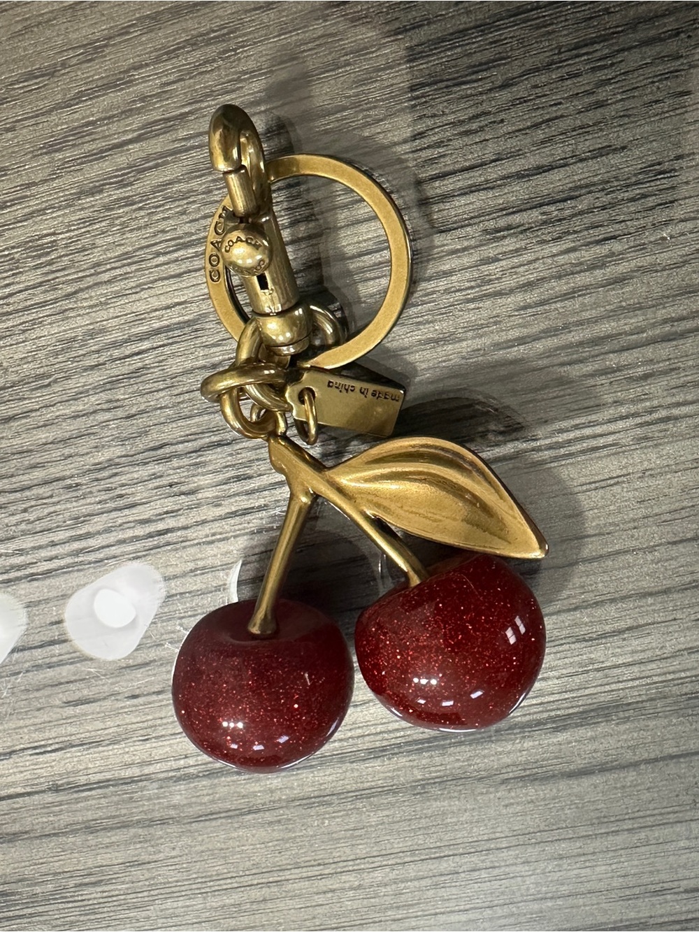 Coach Gold-Tone Hardware with Red Glitter Cherry Charm Keychain - Picture 2 of 2